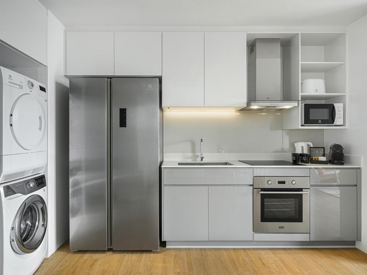 Oakwood Suites Banguecoque Exterior foto A modern kitchen
